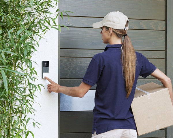 Doorbell delivery woman